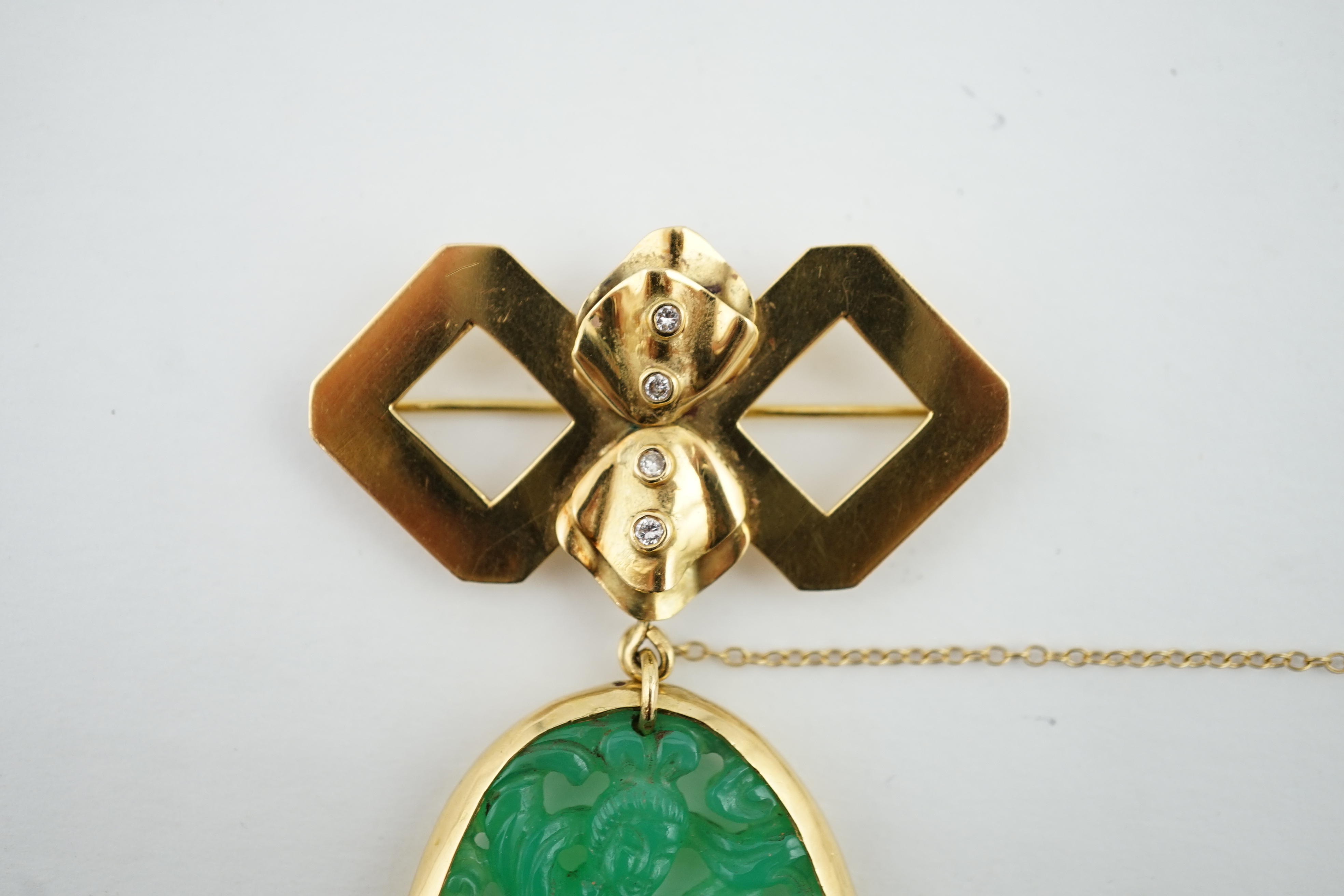 A modern 18ct gold and four stone diamond mounted jadeite drop brooch